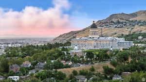 Aerial view at dusk of a mountain view and the Capitol Building