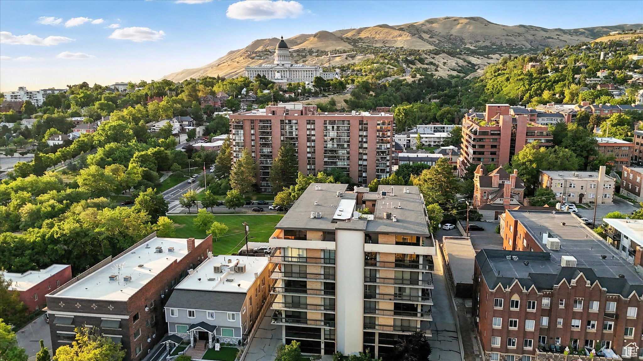 Drone / aerial view of mountains overlooking the Capitol Building