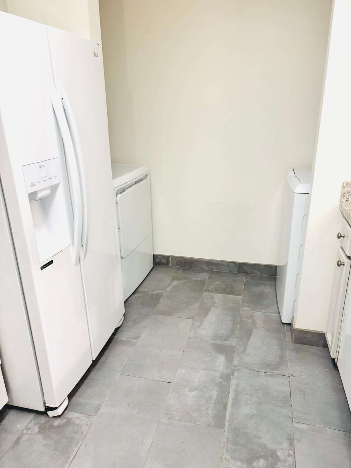 Laundry area featuring washer / dryer