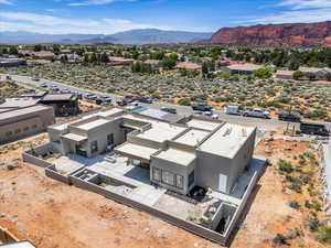 Aerial view of residential area with a mountain backdrop