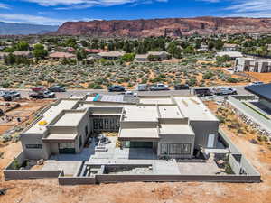 Aerial view of residential area with a mountainous background