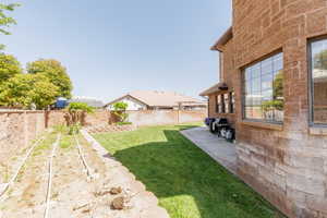 View of fenced backyard
