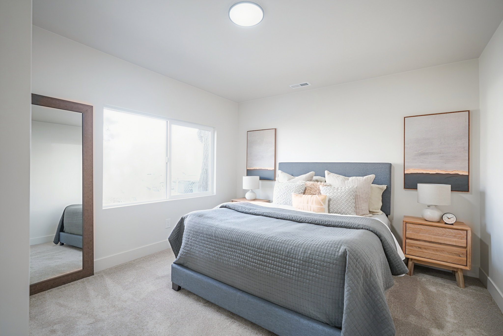 Carpeted bedroom with baseboards