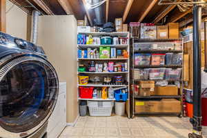 Basement laundry room with tons of storage
