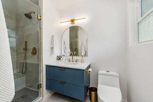 Beautifully remodeled master bathroom with fresh tile, vanity, high end fixtures