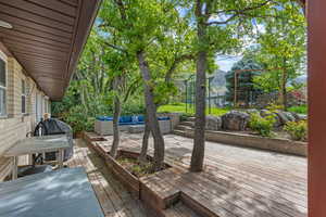 View of Deck off of kitchen/master bathroom
