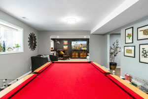 Rec room featuring baseboards and pool table