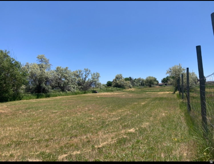 View of yard with a view of countryside