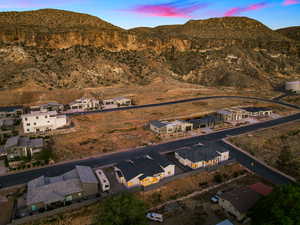 Aerial view at dusk of a residential view and a mountain view