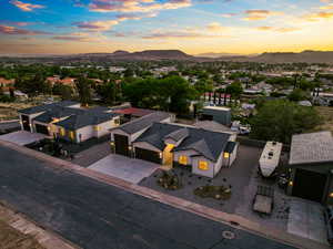 Aerial view of residential area with a mountain backdrop