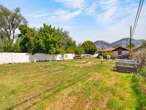 View of yard featuring a mountain view