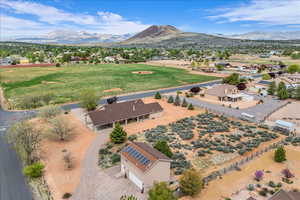 Aerial view of residential area with a mountainous background