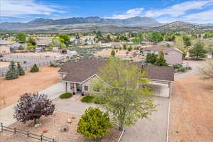 Aerial perspective of suburban area with a mountain backdrop