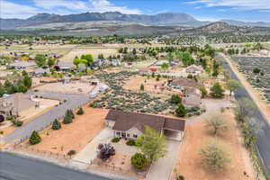 Aerial view of residential area featuring mountains
