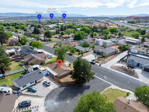 Aerial view of residential area featuring mountains