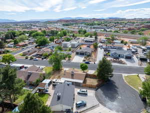 Aerial view of residential area featuring a mountain backdrop