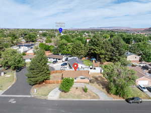 Aerial view of residential area featuring a mountain backdrop