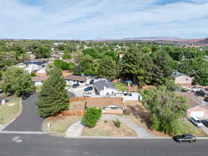 Aerial view of residential area featuring mountains