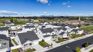 Aerial view of residential area featuring mountains