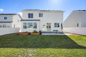 Back of house featuring a patio, a fenced backyard, and stucco siding