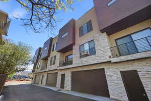 View of property featuring a garage