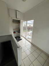 Kitchen featuring light tile patterned flooring