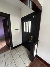 Foyer with baseboards