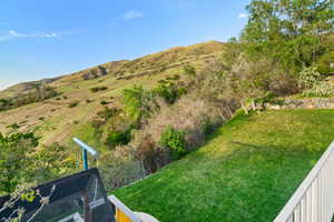 View of yard with a mountain view