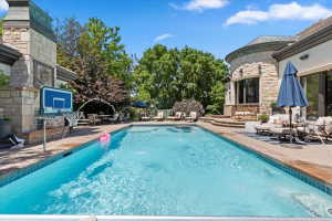 Saltwater pool set within beautifully landscaped, private backyard