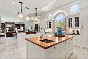 Kitchen features generous workspaces