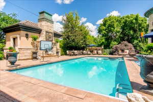 Saltwater pool surrounded by mature landscaping