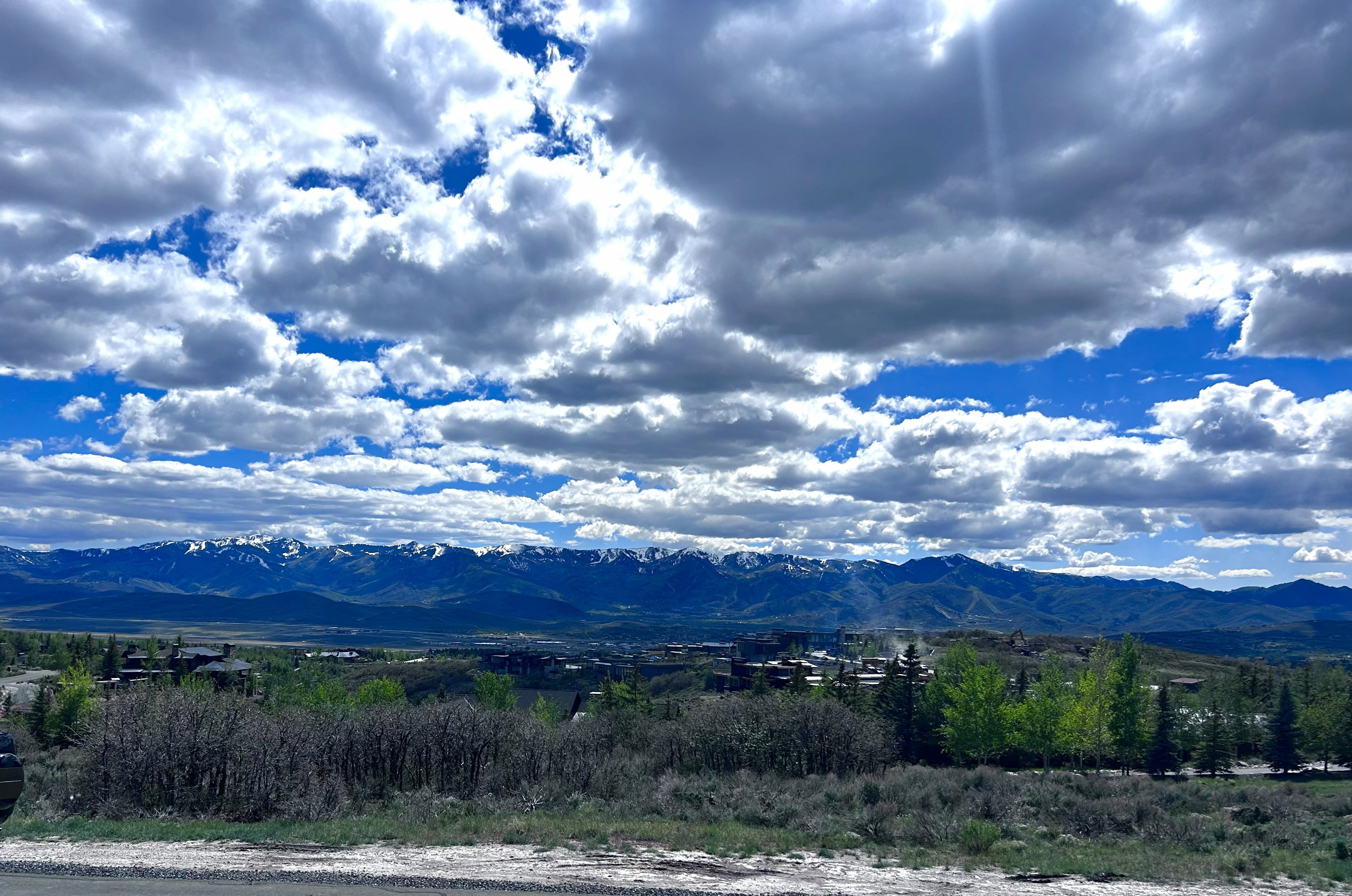 Expansive mountain range with snow-capped peaks