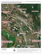 Aerial map of property and surrounding area with property boundaries highlighted