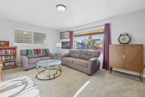 Living room featuring carpet flooring