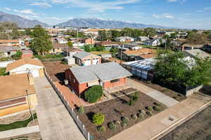 Aerial view of residential area featuring mountains