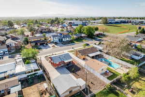 Aerial perspective of suburban area with a pool area