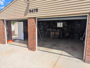 Garage with concrete driveway
