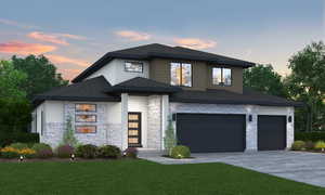 View of front of home featuring stone siding, roof with shingles, concrete driveway, and a lawn