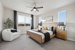 Bedroom with carpet and a ceiling fan