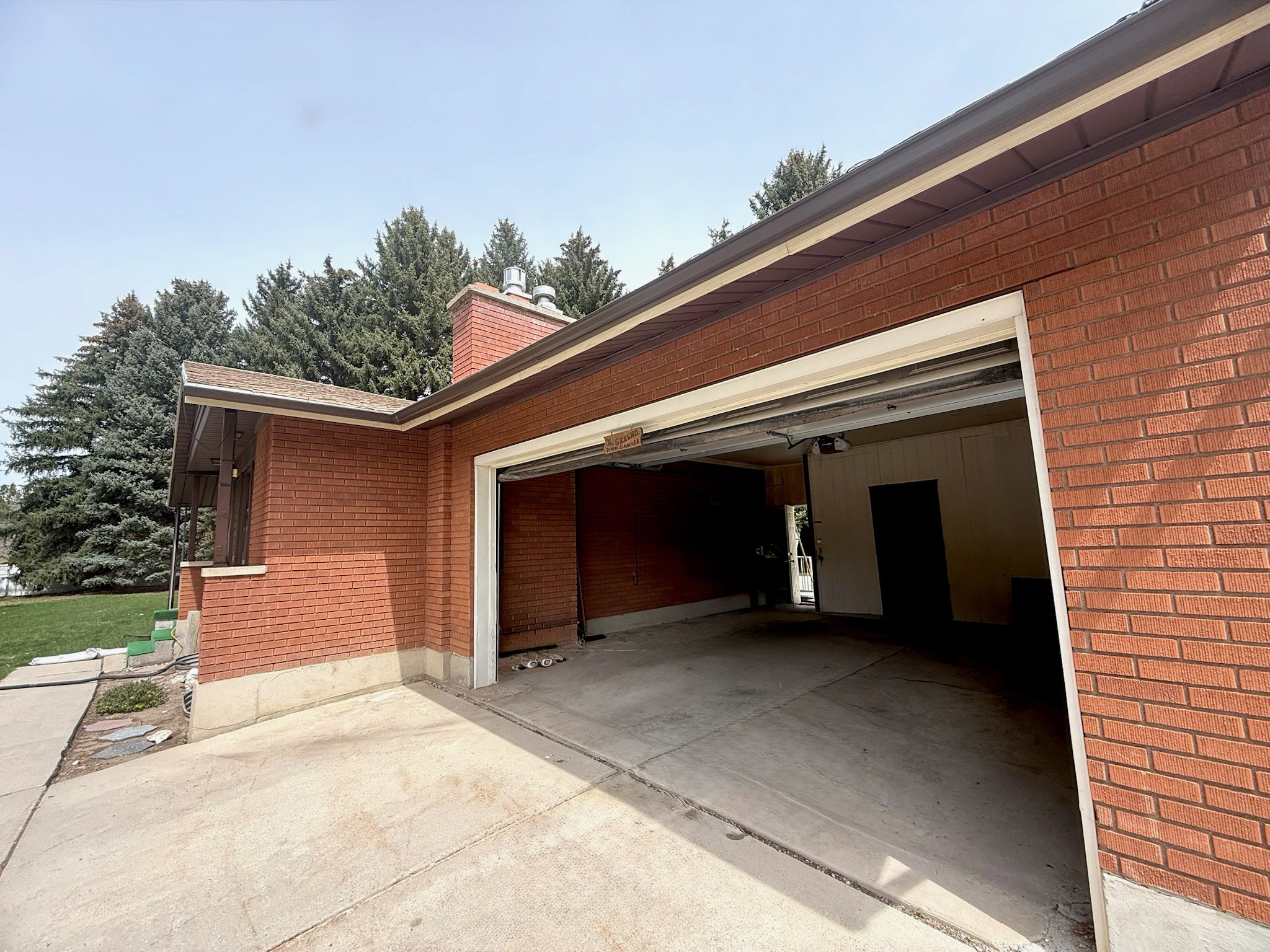 Garage with concrete driveway