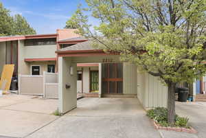 View of front of property featuring roof with shingles