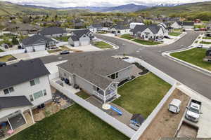 Aerial view of residential area featuring mountains