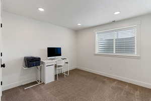 Home office featuring light carpet and recessed lighting