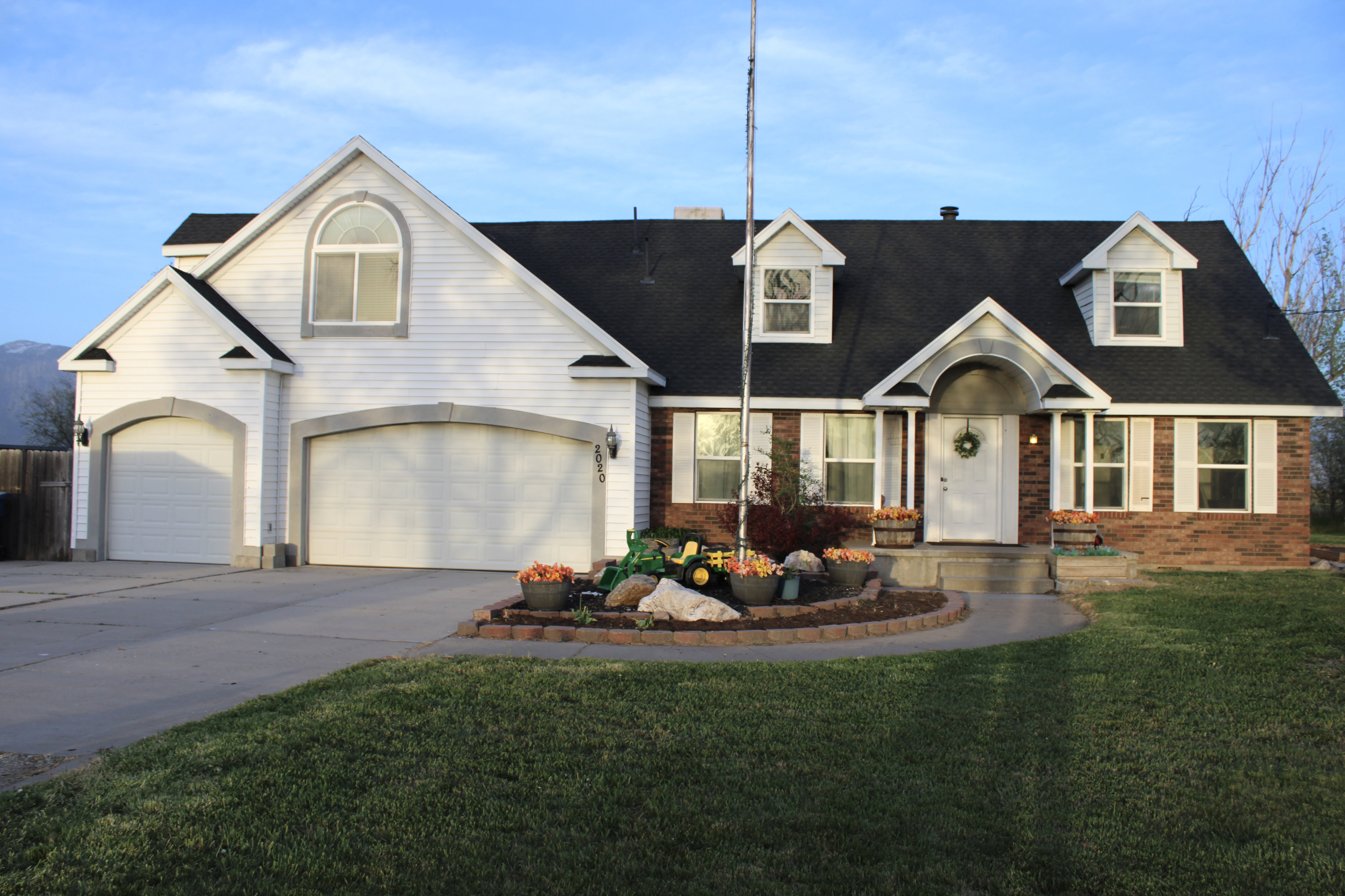 Front of home and entry sidewalk