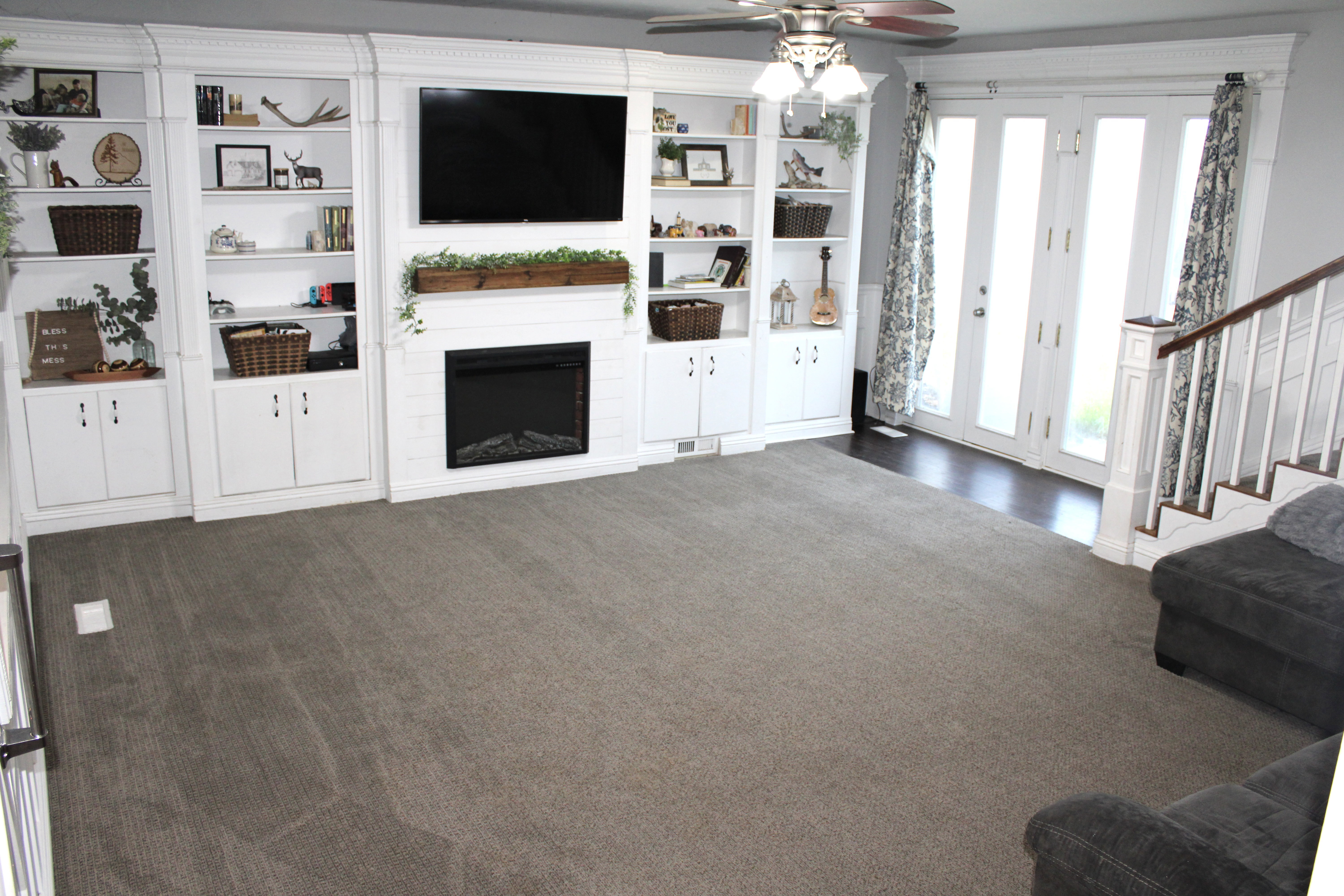 Large living area with built in storage