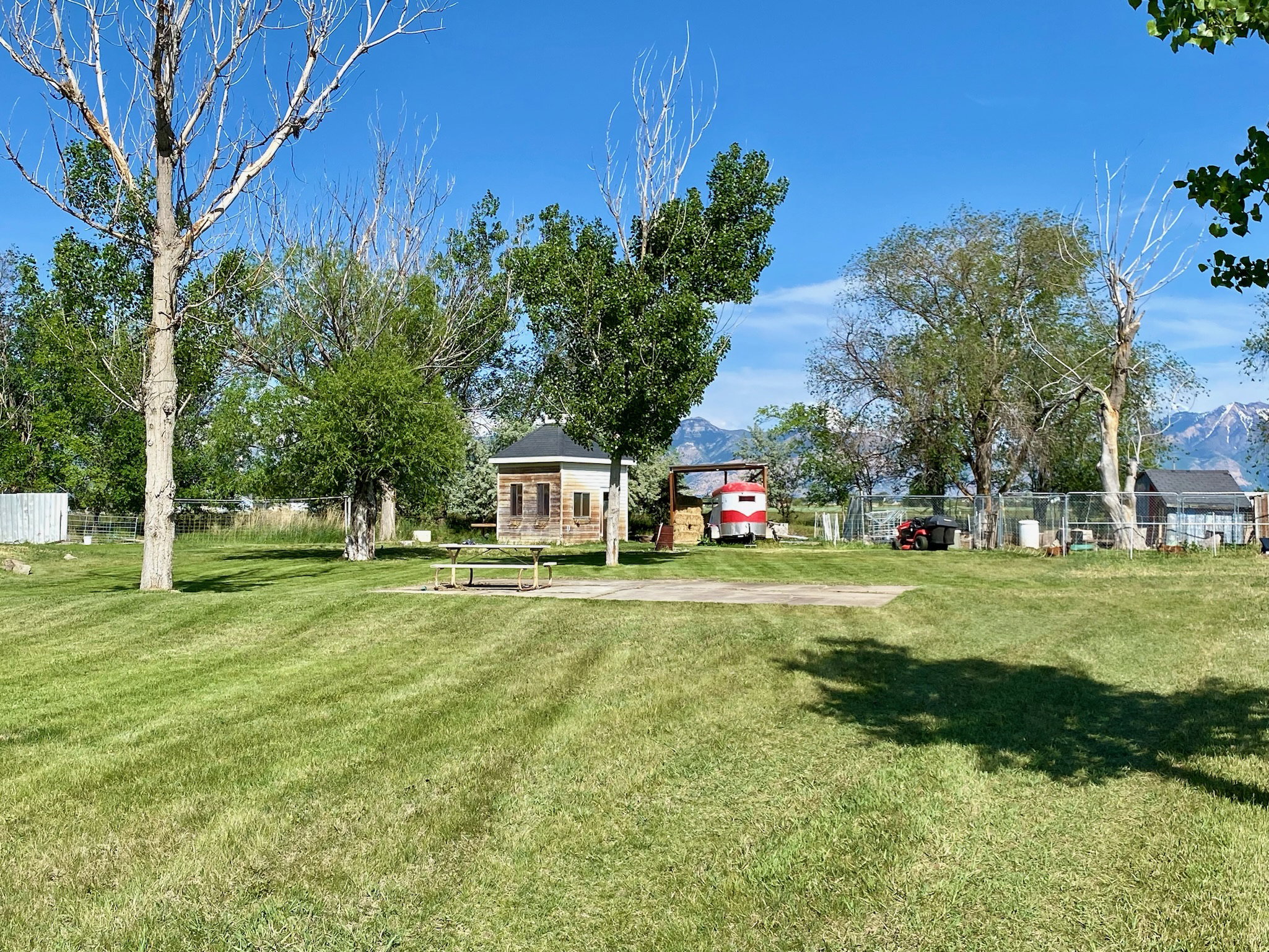 View of yard with mountain view and a gazebo