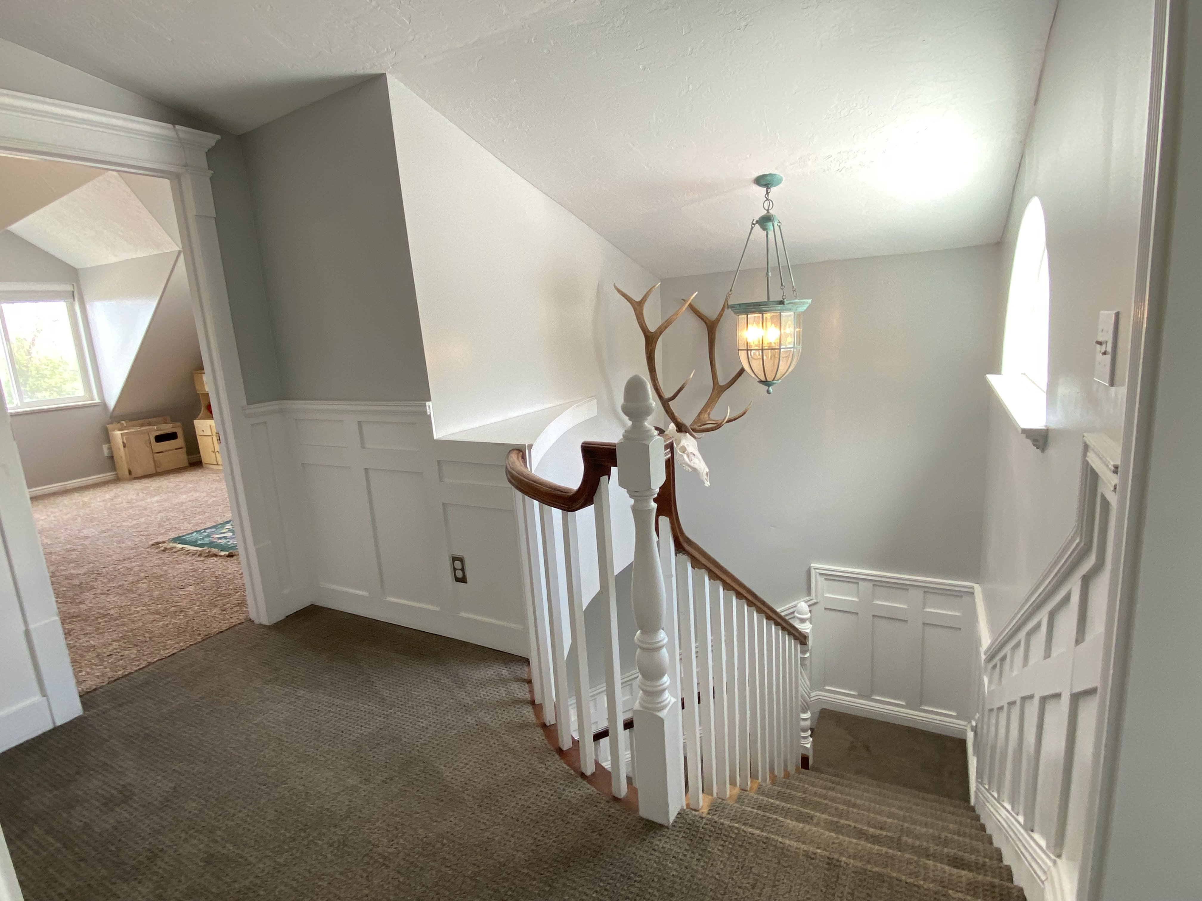 Second Staircase with a wainscoted wall