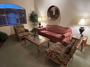 Living room featuring sleeper sofa and oversized chairs