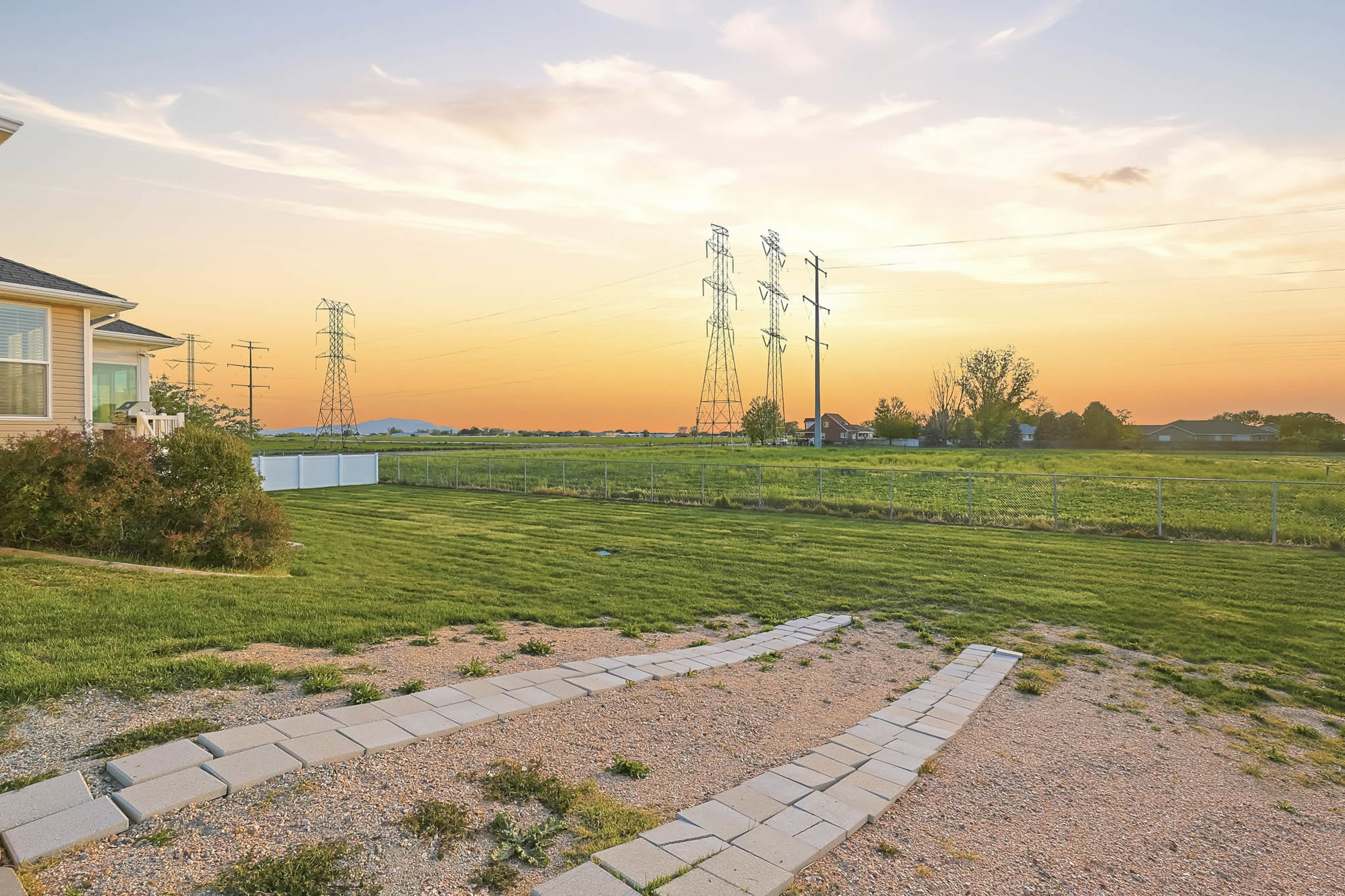 View of yard at dusk