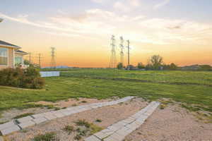 View of yard at dusk
